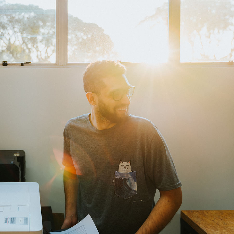 Person Unpacking a New Wireless Printer
